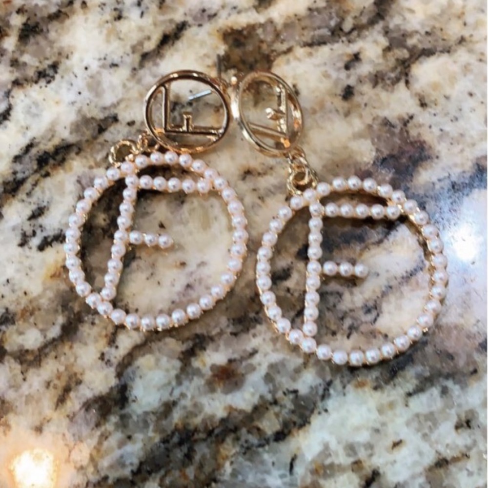 Classy sold out everywhere earrings Fendi